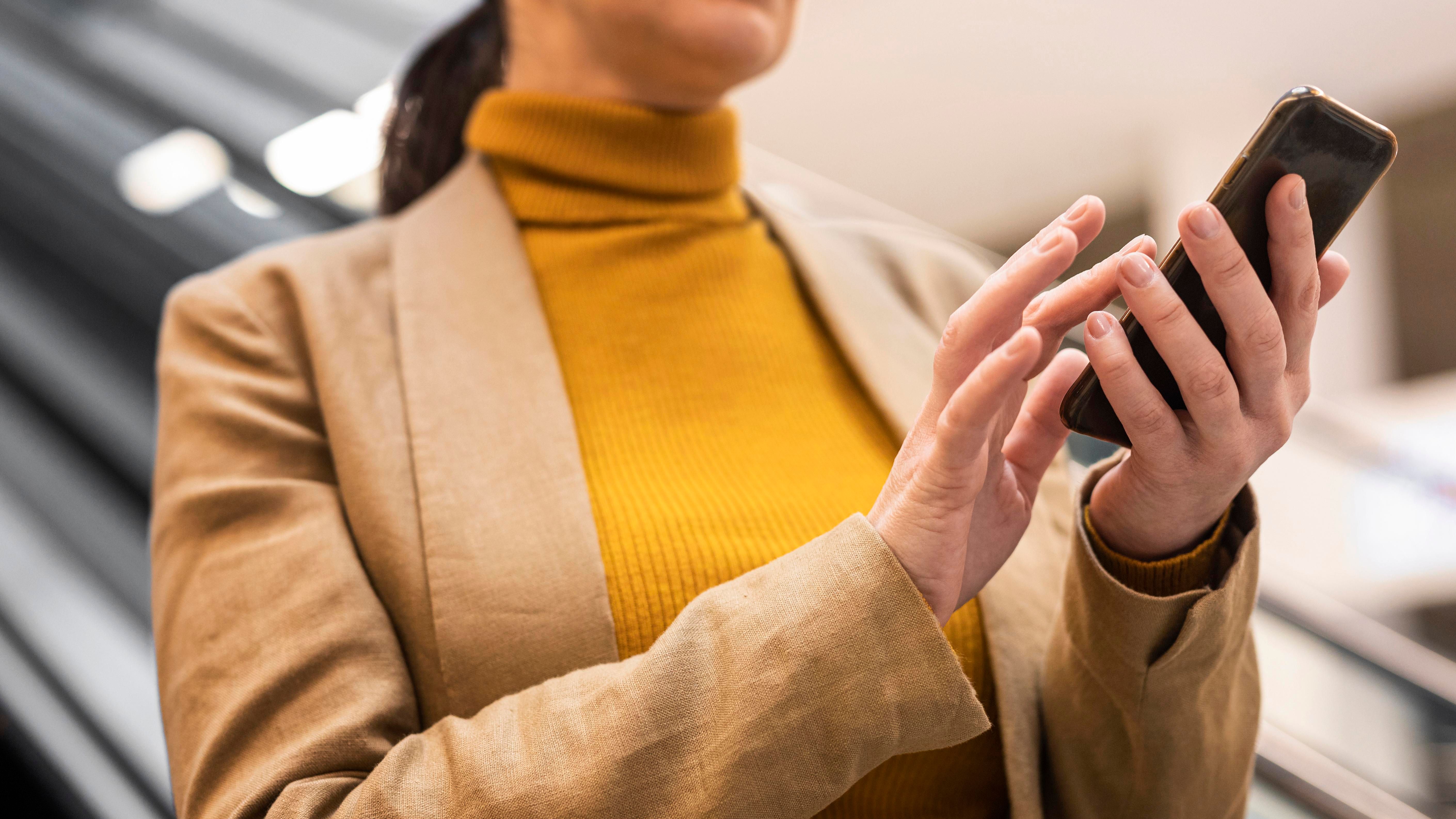 Close up Woman Holding Smartphone